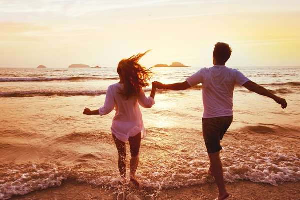 happy couple on the beach